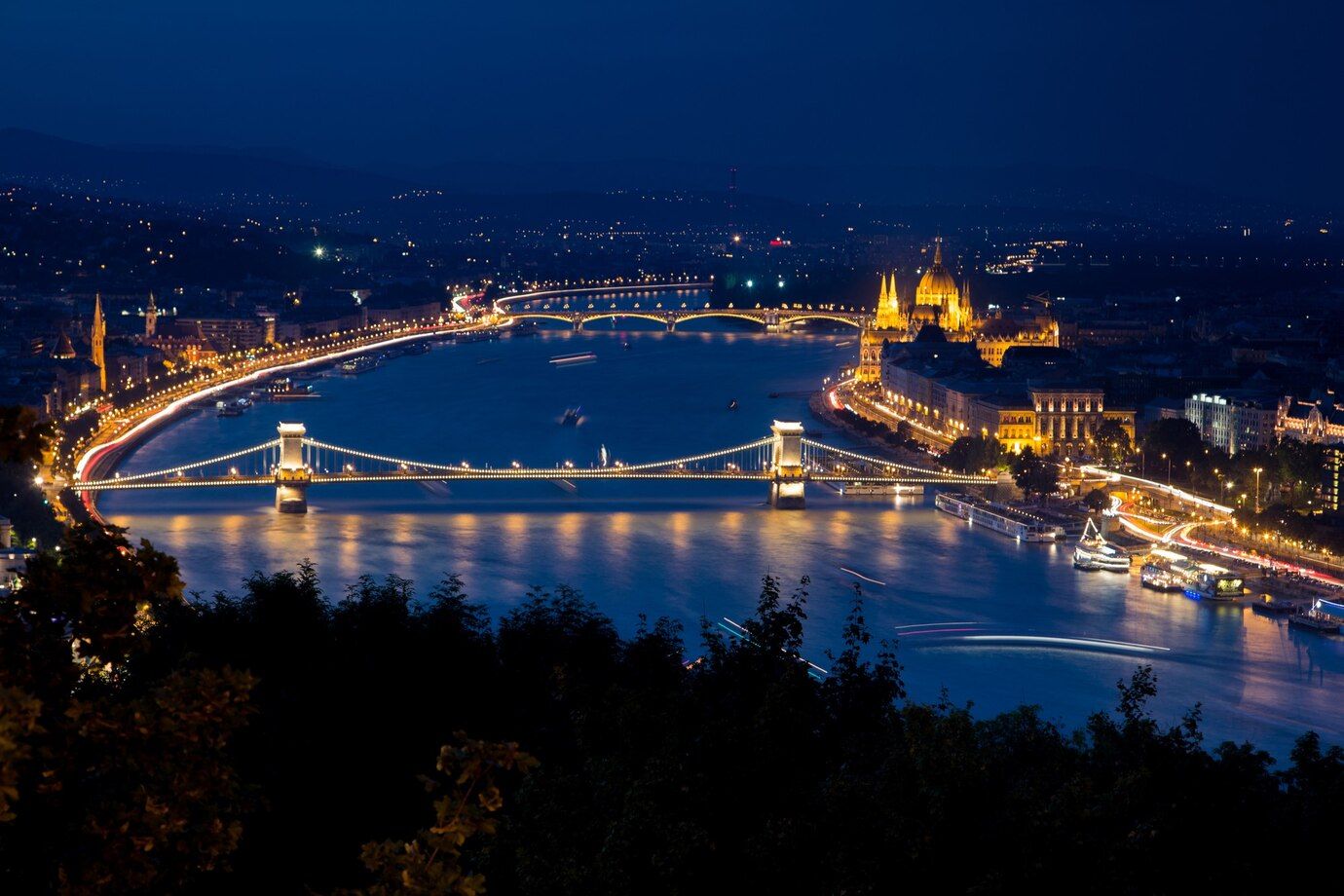 buda-castle-surrounded-by-buildings-lights-night-budapest_181624-10424.jpg