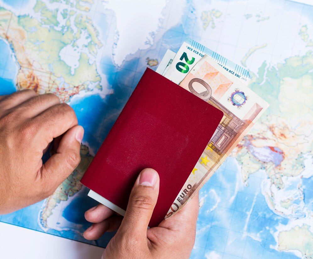 closed-wallet-with-euros-world-map_23-2148256054.jpg